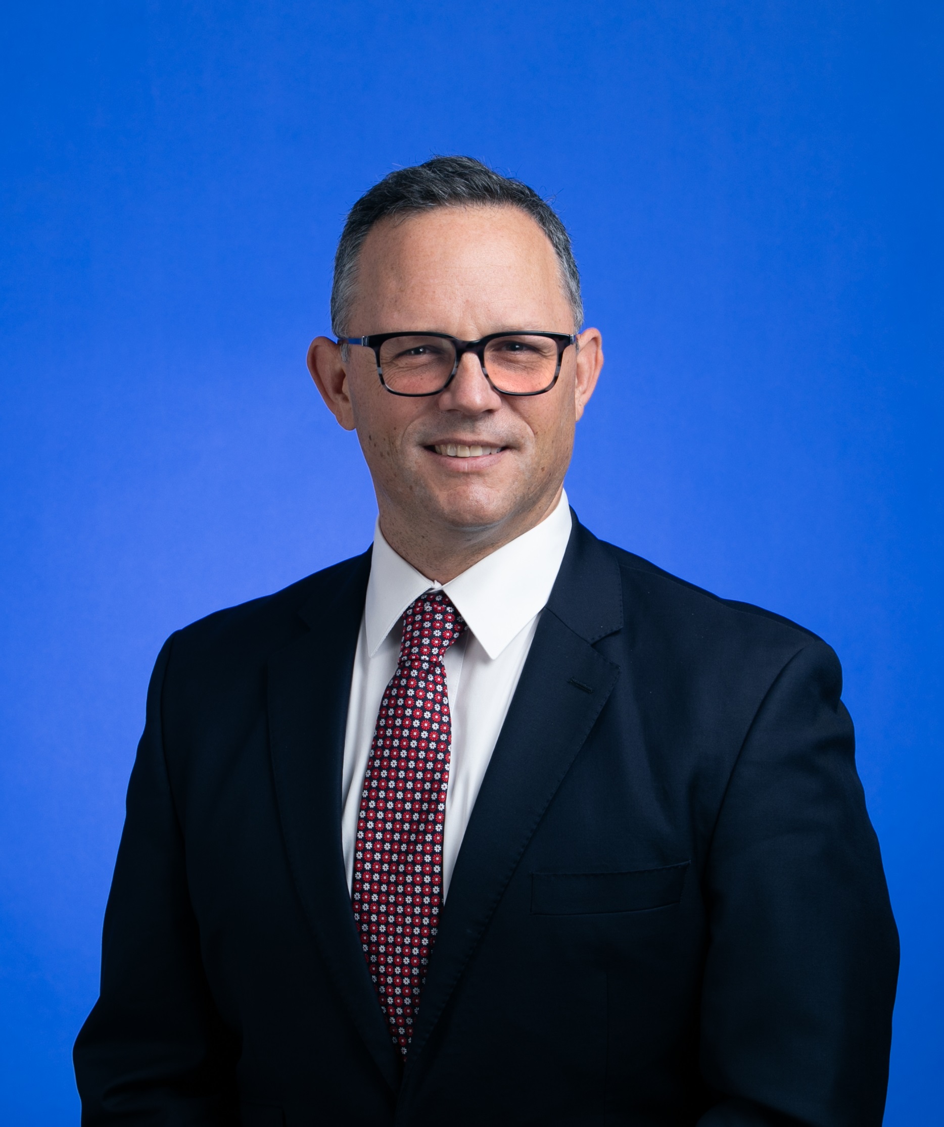 Dr. Douglas De Couto, JP, MP